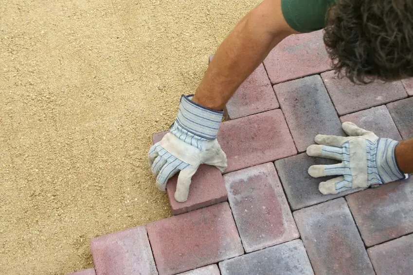 Block paving being cut to fit