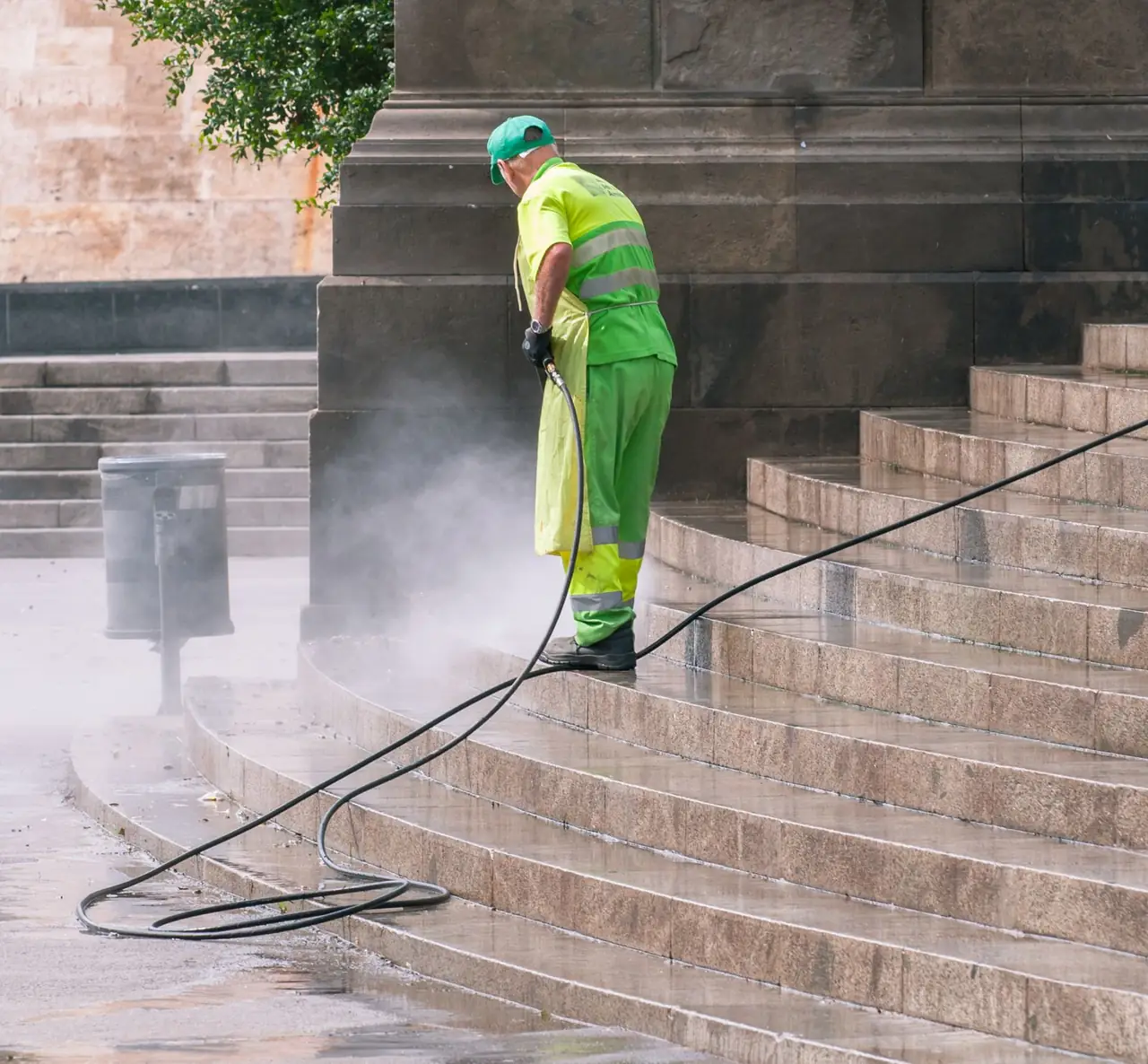 Paving being pressure washed clean