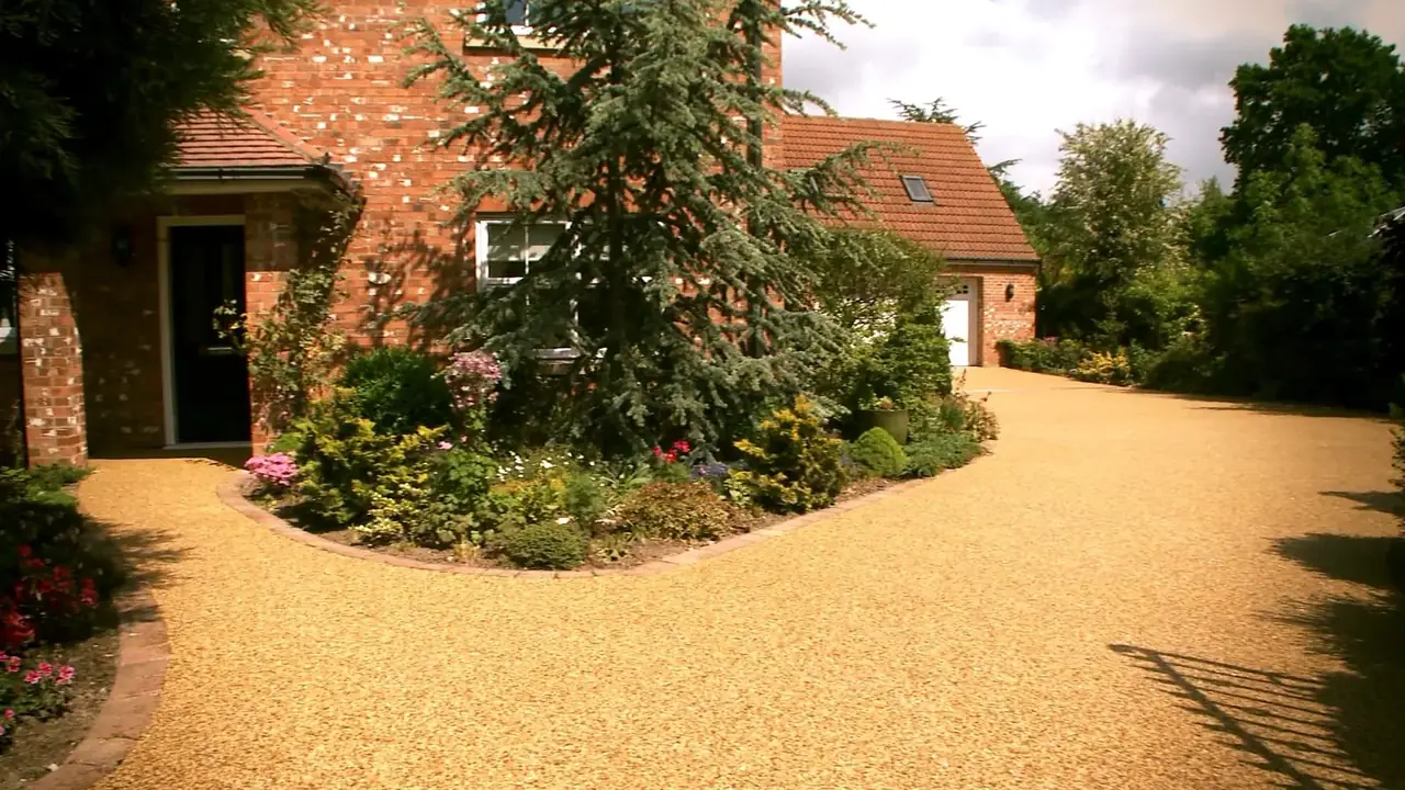 Resin driveway and planted garden