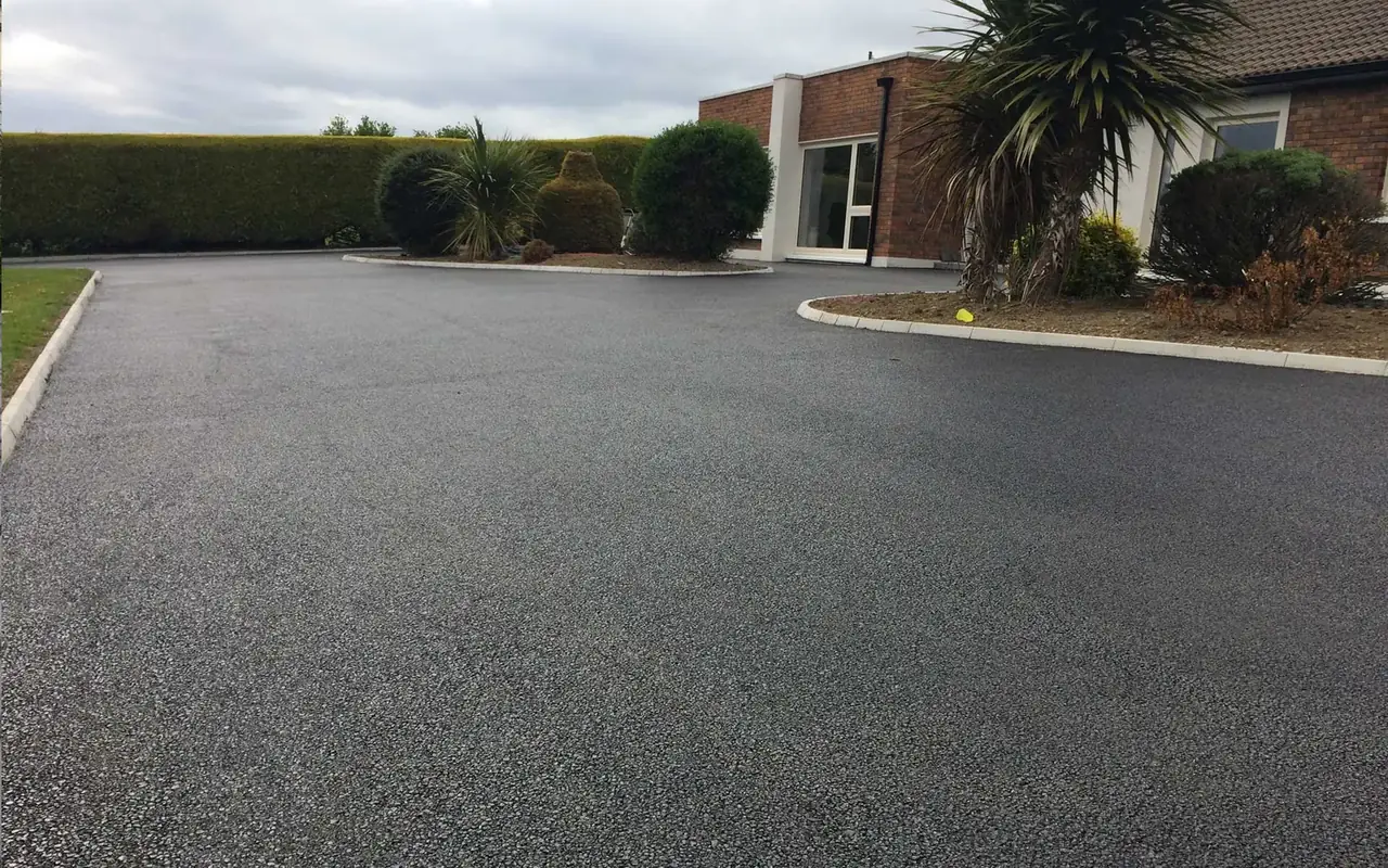 Wide tarmac driveway with neat edging